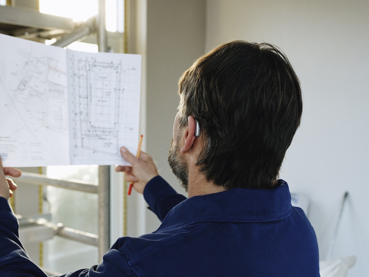 Reviewing architectural drawings on site